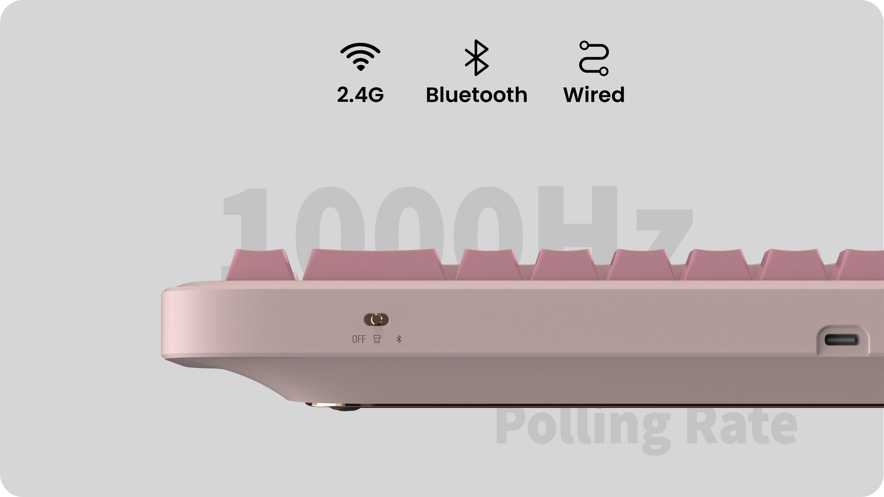 Side view of the pink Spacetime 65 showing Bluetooth, 2.4G wireless and USB-C modes